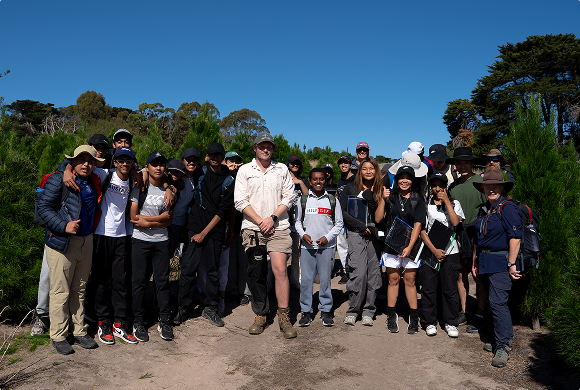 A group photo of school students with Yeowarra employee, Josh.